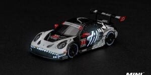 1:64 Scale. Porsche 911 GT3 R (992) #77 AO Racing "Skeleton Rexy" 2026 IMSA Petit Le Mans. MINI GT (blister pack)