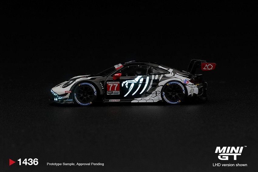 1:64 Scale. Porsche 911 GT3 R (992) #77 AO Racing "Skeleton Rexy" 2026 IMSA Petit Le Mans. MINI GT (boxed)